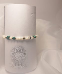 Изящна комбинация от естествени камъни и блестящи елементи